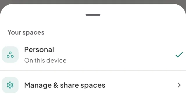 The Your spaces sheet with one row per space, the space in use ticked, and Manage & share spaces at the foot